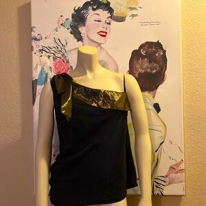 Beautiful blouse with a gold bow from the brand Tibi.